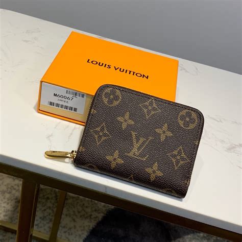 lv coin purse white|Lv zippy coin purse.